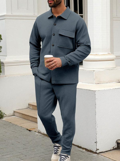 KZZ Men's two-piece casual suit with a stand-up collar long sleeves with a subtle texture