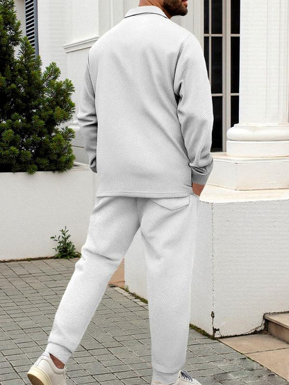 KZZ Men's two-piece casual suit with a stand-up collar long sleeves with a subtle texture